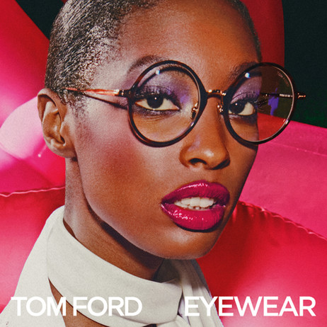 A model wearing round Tom Ford glasses