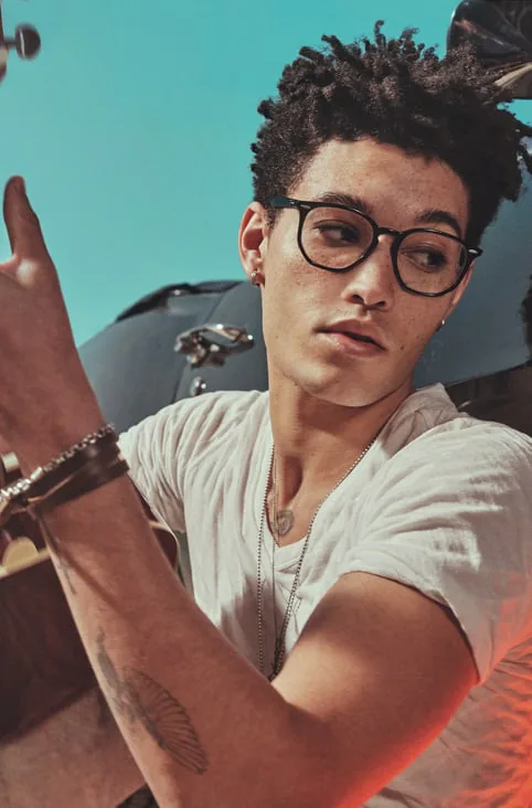 A model wearing round glasses